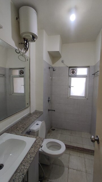 Bathroom in 3 BHK Apartment at Moti Nagar – for Sale