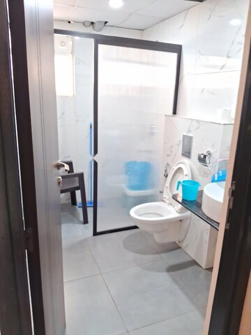 Bathroom in 3 BHK Apartment at Ambience Courtyard, Manikonda – for Rent