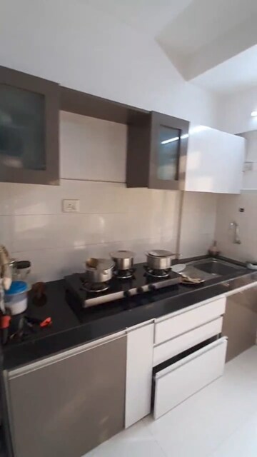 Kitchen in 3 BHK Apartment at RNA N G Silver Spring, Mira Road – for Sale