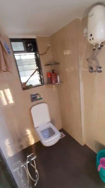 Bathroom in 3 BHK Apartment at RNA N G Silver Spring, Mira Road – for Sale