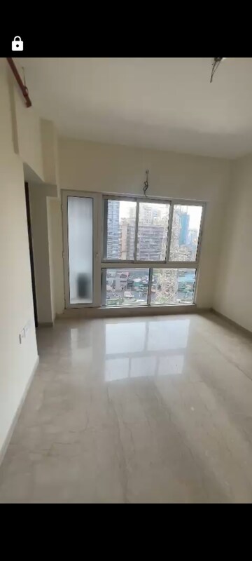 Living Room in 1 BHK Apartment at Omkar Signet, Malad East – for Rent