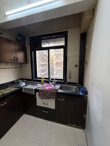 Kitchen in 1 BHK Apartment at Seawoods – for Sale