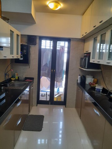 Kitchen in 2 BHK Apartment at Hubtown Hillcrest, Andheri East – for Rent