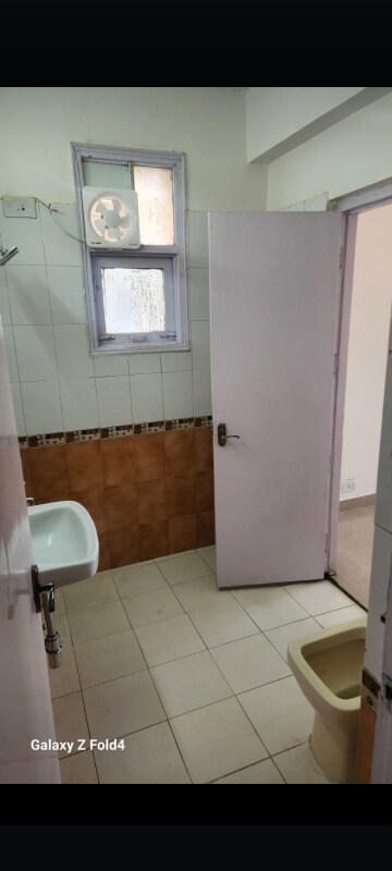Bathroom in 2 BHK Apartment at Parsvnath Majestic Floors, Vaibhav Khand – for Rent