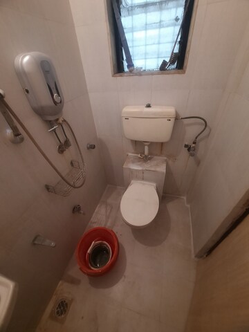 Bathroom in 1 BHK Apartment at Raunak Unnathi Greens, Kasarvadavali – for Sale