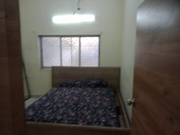 Bedroom in 1 BHK Apartment at Navyug Niwas, Grant Road – for Rent