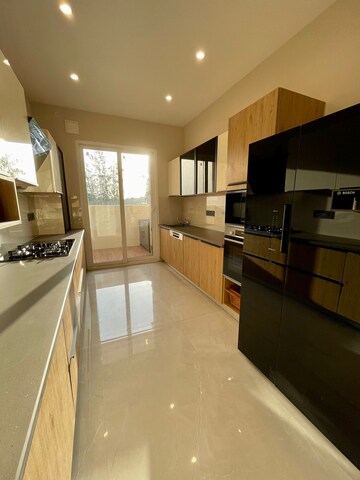 Kitchen in 4 BHK Apartment at The Ananta Aspire, Utrathiya – for Sale