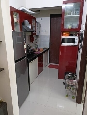Kitchen in 1 BHK Apartment at Raunak Bliss, Ghodbunder Road – for Rent