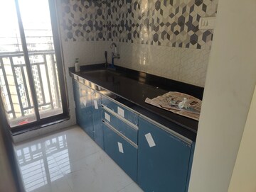 Kitchen in 1 BHK Apartment at Puranik Aarambh, Ghodbunder Road – for Rent