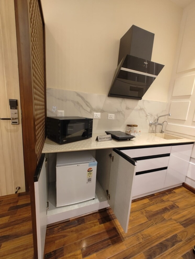 Kitchen, saya-south-x Studio 688 Sq.Ft. Apartment In Sector 16c Greater Noida Greater Noida 8199040