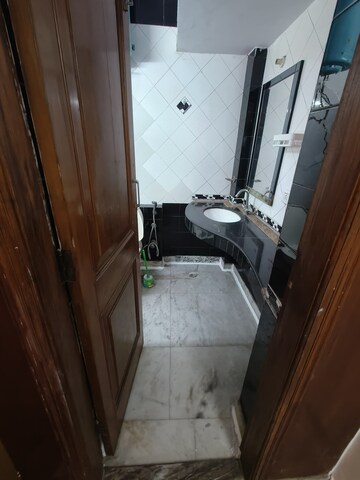 Bathroom in 2 BHK Builder Floor at East Of Kailash – for Rent