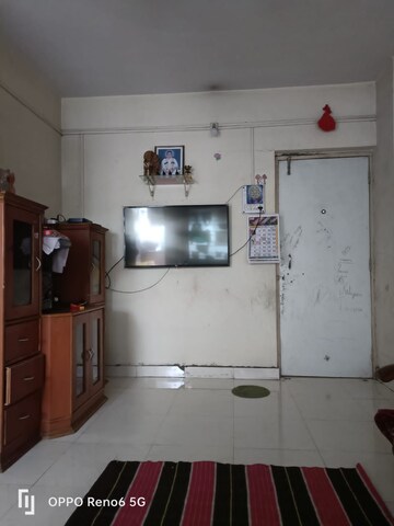 Living Room in 1 BHK Apartment at Vardhaman Township, Hadapsar – for Rent