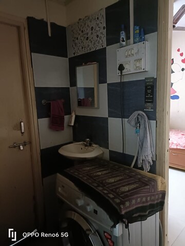 Bathroom in 1 BHK Apartment at Vardhaman Township, Hadapsar – for Rent