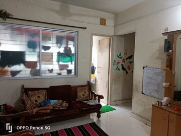 Living Room in 1 BHK Apartment at Vardhaman Township, Hadapsar – for Rent