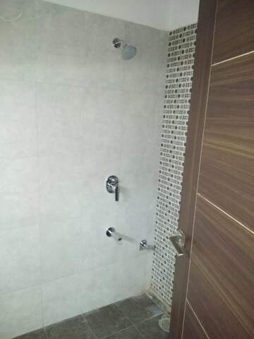 Bathroom in 3 BHK Apartment at Abhinandan Riddhi Siddhi Homes Villas, Mansarovar – for Rent