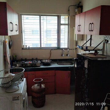 Team Area in 1 BHK Apartment at Karan Rhea, Wadegaon – for Rent