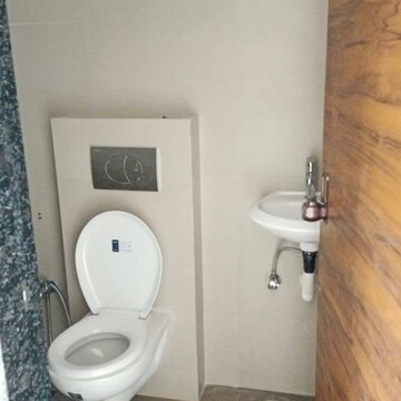 Bathroom in 2 BHK Apartment at Suncity Souvenir, Jamil Nagar – for Rent
