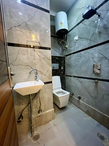 Bathroom in 2 BHK Builder Floor at Dwarka Mor – for Rent