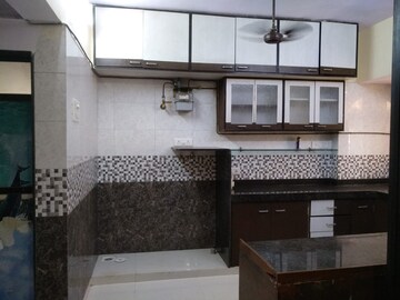 Kitchen in 2 BHK Apartment at Green Fields Apartment, Andheri East – for Rent