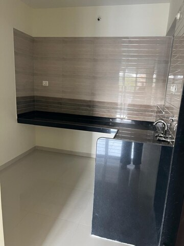 Kitchen in 2 BHK Apartment at Lifestyle Royal Oak, Wakad – for Rent