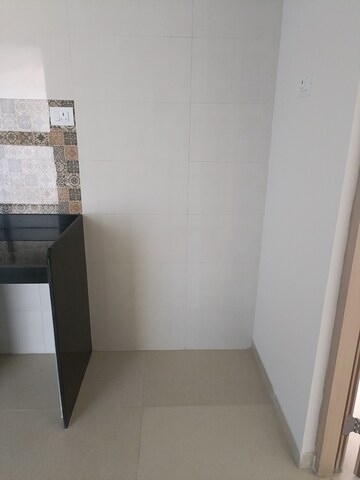 Kitchen in 2 BHK Apartment at Rajesh Raj Infinia, Malad West – for Rent