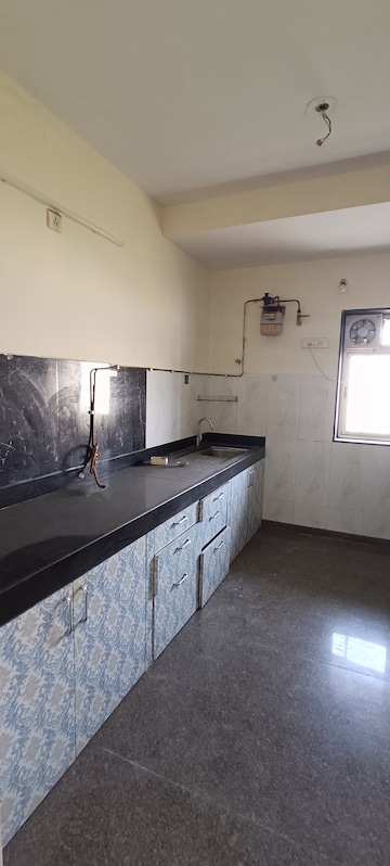 Kitchen in 3 BHK Apartment at Kalpataru Pristine, Manpada – for Rent
