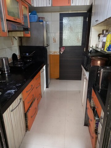 Kitchen in 2 BHK Apartment at Madhurima CHS, Andheri West – for Rent