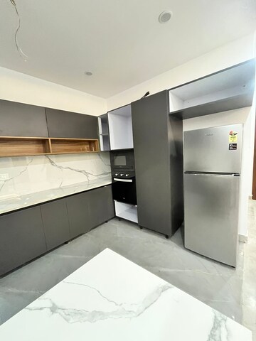 Kitchen in 4 BHK Builder Floor at Ansal Royale Casa, Sector 55 – for Rent
