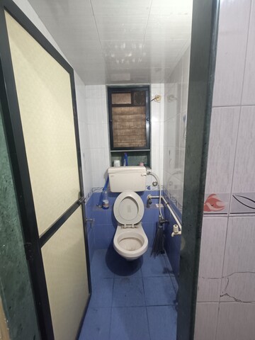 Bathroom in 1 BHK Apartment at Shiv Kirti Apartment, Malad West – for Rent