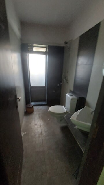 Bathroom in 1 BHK Apartment at Highland Residency CHSL, Balkum Pada – for Rent