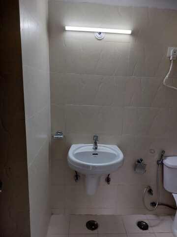 Bathroom in 4 BHK Apartment at Amrapali Sapphire, Sector 45 – for Sale
