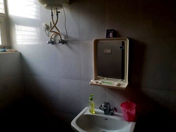 Bathroom in 2 BHK Apartment at Omega Green Park, Faizabad Road – for Sale