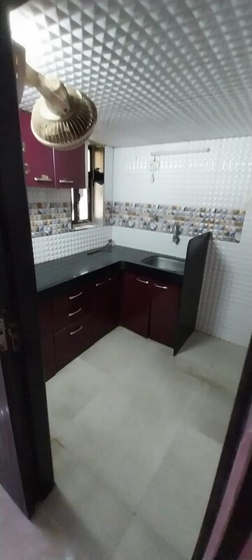 Kitchen in 1.5 BHK Apartment at Amisha CHS, Dahisar West – for Rent