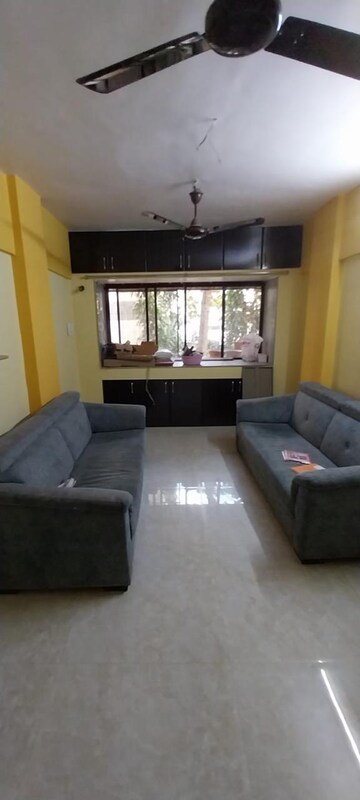 Living Room in 1.5 BHK Apartment at Amisha CHS, Dahisar West – for Rent