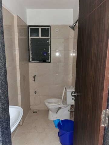 Bathroom in 1 BHK Apartment at Vijayalaxmi Laxmisatyam Residency, Dhanori – for Rent