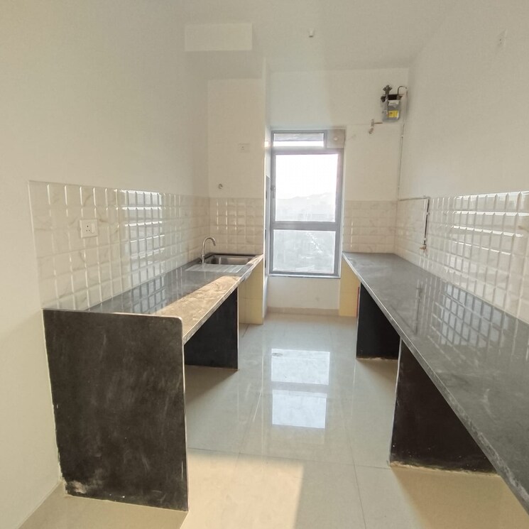Kitchen, kalpataru-immensa-c 2 Bedroom 808 Sq.Ft. Apartment In Kolshet Industrial Area Thane 8201556
