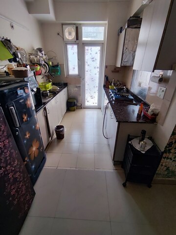 Kitchen in 3 BHK Apartment at Amrapali Zodiac, Sector 120 – for Sale
