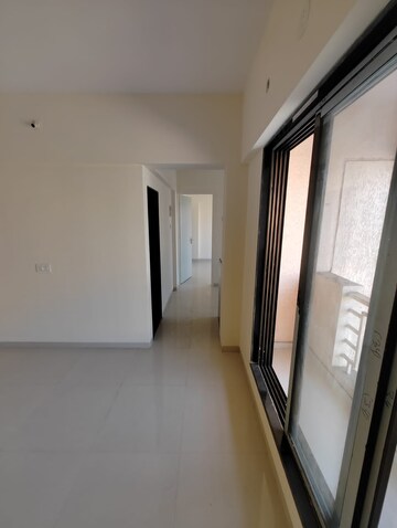 Building Lobby in 2 BHK Apartment at Pranjee Garden City, Katrap – for Sale