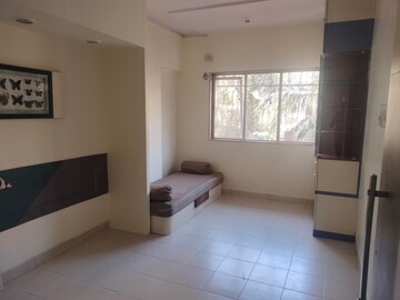 Bedroom in 2 BHK Apartment at Raj Shivam Society, Dahisar East – for Rent