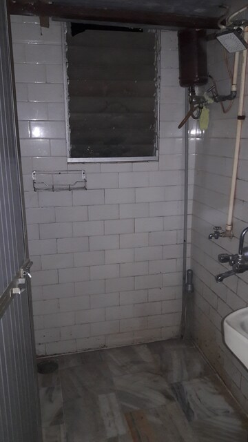 Bathroom in 1 BHK Apartment at Doordarshan CHS, Goregaon East – for Rent