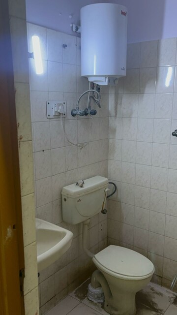 Bathroom in 2 BHK Apartment at Royal Garden Estate, Sector 61 – for Rent