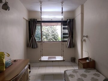 Living Room in 2 BHK Apartment at Borivali West – for Rent