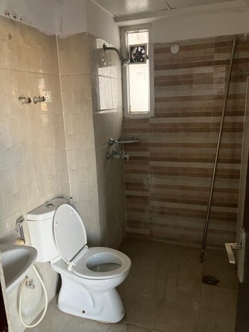 Bathroom in 3 BHK Apartment at Nirala Estate, Tech Zone 4 Greater Noida – for Rent