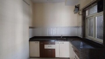 Kitchen in 2 BHK Apartment at Siddhi Highland Gardens, Dhokali – for Sale