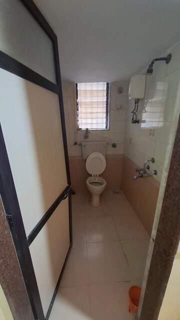Bathroom in 2 BHK Apartment at Akhil Sundaram, Kandivali West – for Rent