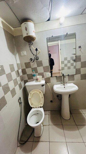 Bathroom in 3 BHK Apartment at Sam Palm Olympia, Sector 16c Greater Noida – for Rent