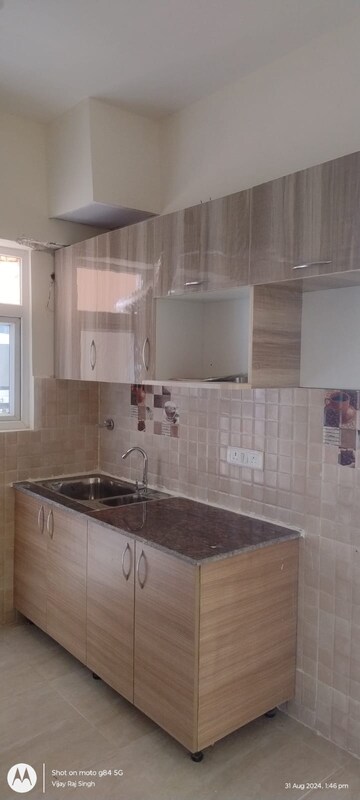 Kitchen in 2 BHK Apartment at Gaur City 2 - 14th Avenue, Sector 16c Greater Noida – for Rent