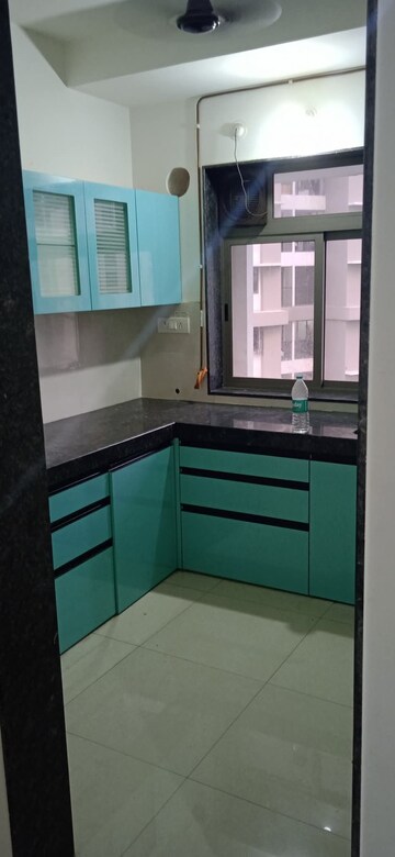 Kitchen in 2 BHK Apartment at Runwal Eirene, Balkum Pada – for Rent
