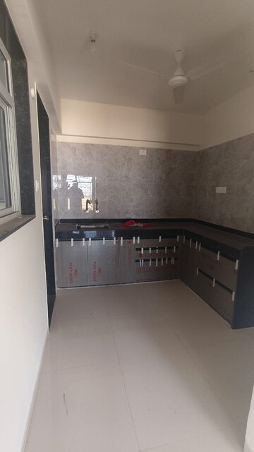 Kitchen in 2 BHK Apartment at Ten United Athashri, Dhanori – for Rent
