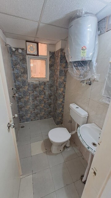 Bathroom in 2 BHK Apartment at Signature The Millennia 2, Sector 37d – for Rent